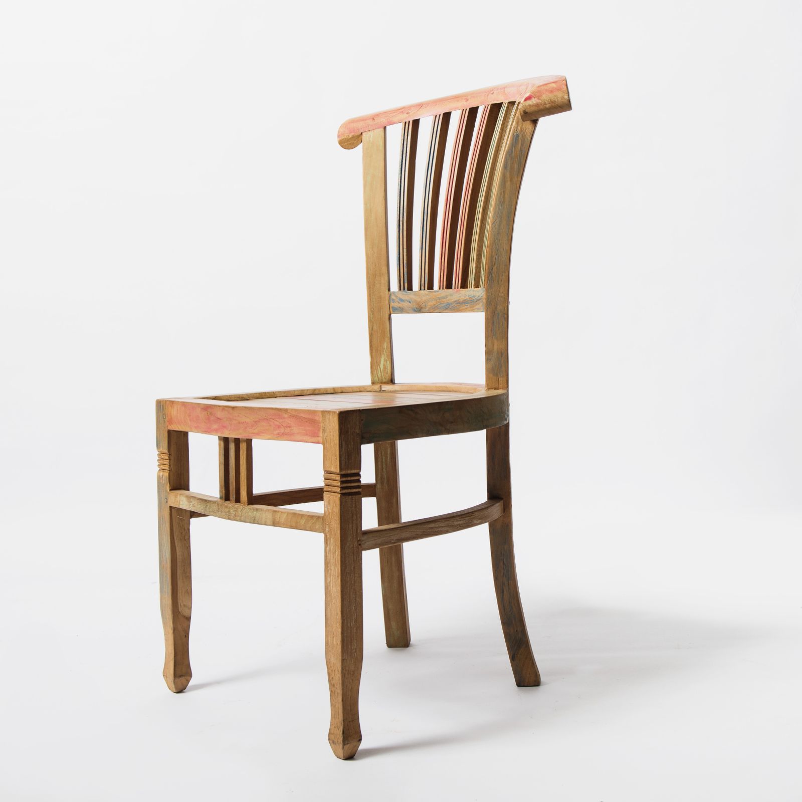 Complete brown wooden chair photographed against a white background
